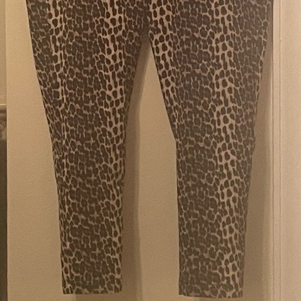 Like an Angel  brand . Plus size 2X ( 18w-20w) stretch band. Leopard print.